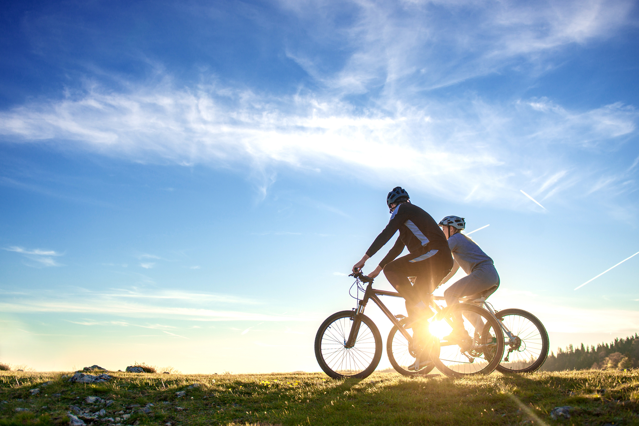 Couple riding bikes