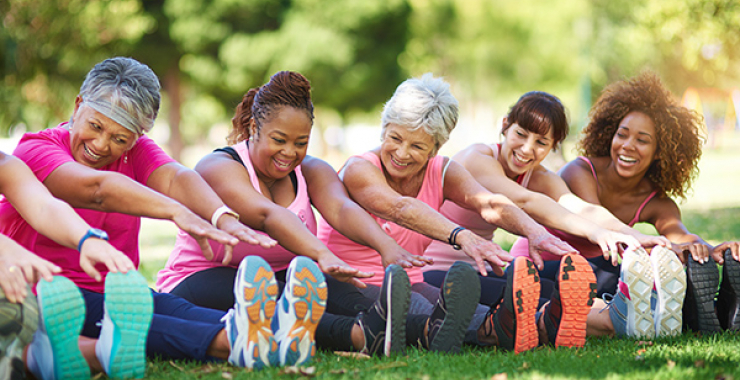 Five women of all ages stretching