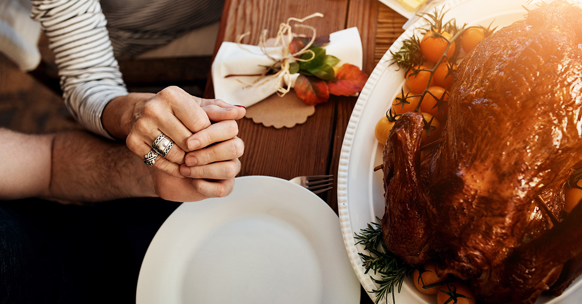 Thanksgiving holiday couple holding hands